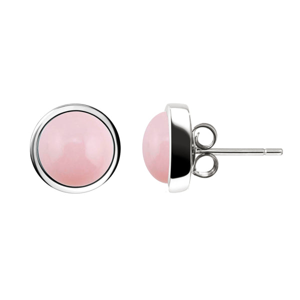 A pair of round stud earrings featuring smooth pink cabochon stones in polished silver bezel settings, shown from front and side angles on a white background.